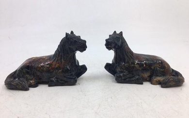 A pair of small Chinese carved stone figures of horses...