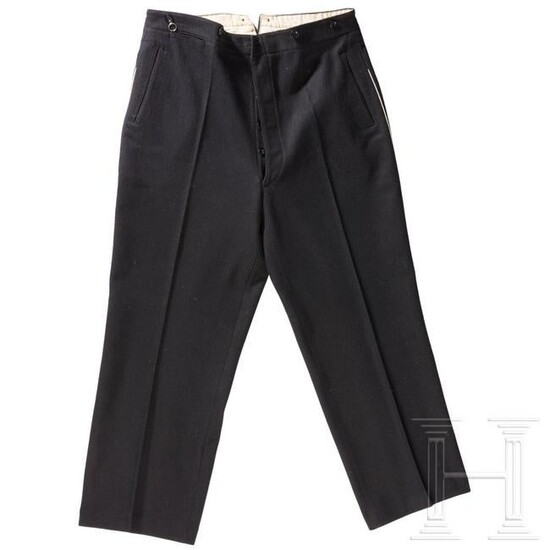 A pair of trousers belonging to the black uniform of