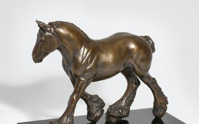 A patinated bronze model of a striding horse