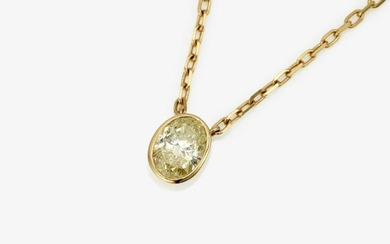 A pendant necklace with an oval diamond solitaire in