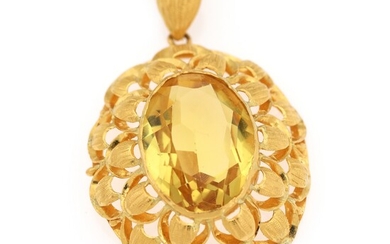 SOLD. A pendant set with a synthetic yellow stone, mounted in 21.6k gold. Accompanied by...