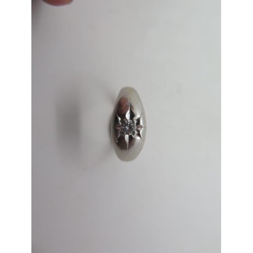 A platinum diamond gypsy ring, marked 900, diamond approx 0....