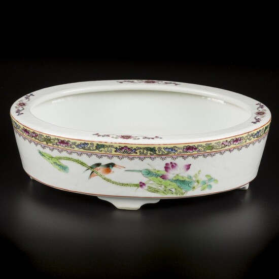 A porcelain famille rose bowl decorated with birds and flowers, marked Zhogguo Jingdezhen Zhi. China,...