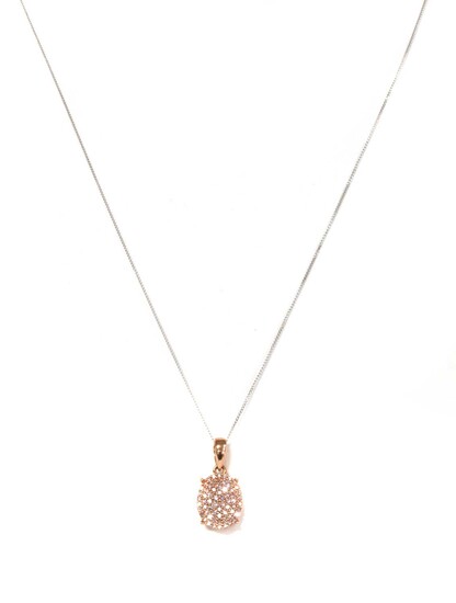 A rose gold oval pink diamond pendant