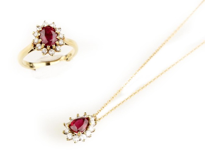 A ruby and diamond pendant with chain, possibly Tiffany & Co., and a ruby and diamond cluster ring