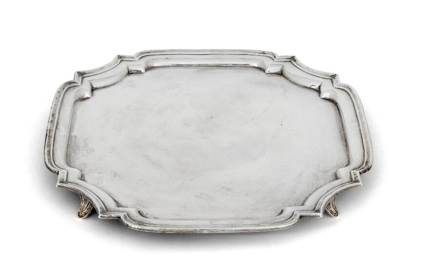 A shaped square silver salver, Sheffield, 1926, Atkin Bros, raised on four bracket feet, 30.5cm dia., approx. weight 26.4oz