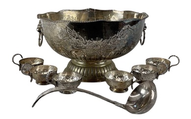 A silver plated punch set comprising large twin handled punch...