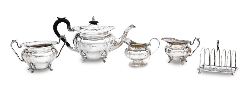 A three piece tea service and further miscellaneous silver