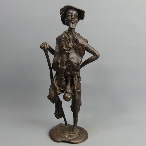 A well modelled mid-20th century African bronze figure of a ...