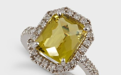 A yellow beryl, diamond, and eighteen karat white gold