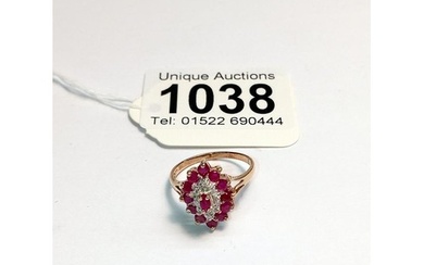 A yellow gold diamond and ruby ring, size M half, 2.42 grams...