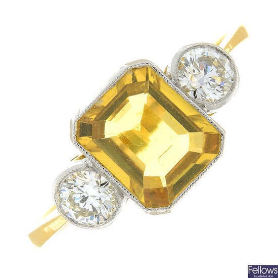 A yellow sapphire and brilliant-cut diamond three-stone ring.