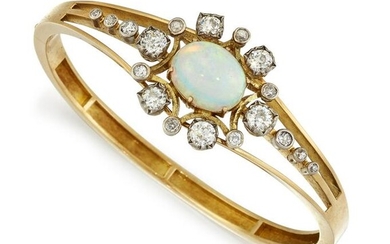 AN 18CT OPAL AND DIAMOND BANGLE, the oval opal