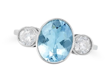 AN AQUAMARINE AND DIAMOND THREE STONE RING set with an oval cut aquamarine between two round cut