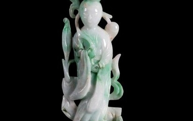 An Apple Green and White Jadeite Figure of a Lady