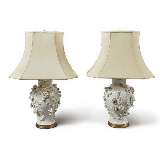 An Assembled Pair of Continental White Porcelain Baluster Vases Mounted as Lamps, An Assembled Pair of Continental White Porcelain Baluster Vases Mounted as Lamps