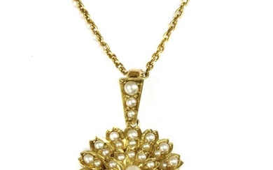 An Edwardian gold split pearl brooch/pendant
