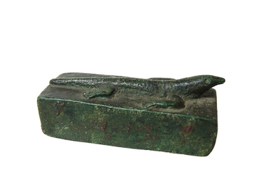 An Egyptian bronze sarcophagus for a lizard