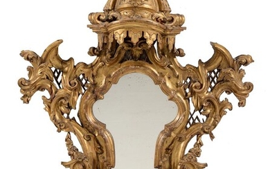 An Italian baroque cartouche shaped wall mirror