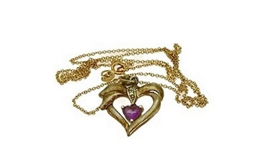 An amethyst and diamond set gold metal heart shaped pendant,...
