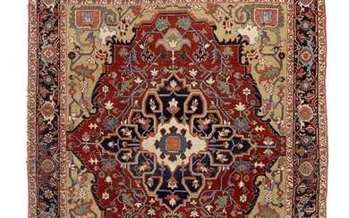 An antique Heriz rug, North West Persia. Executed with the finest sense of natural color combination. C. 1900. 195×165 cm.