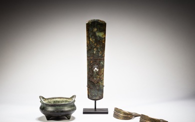 An archaistic jade axe, a bronze tripod incense burner and...