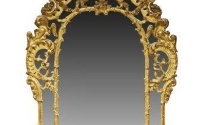 An impressive Régence style carved and gilded...