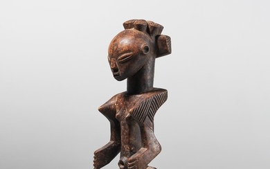 An unsusual Luba Shankadi figure, Congo.