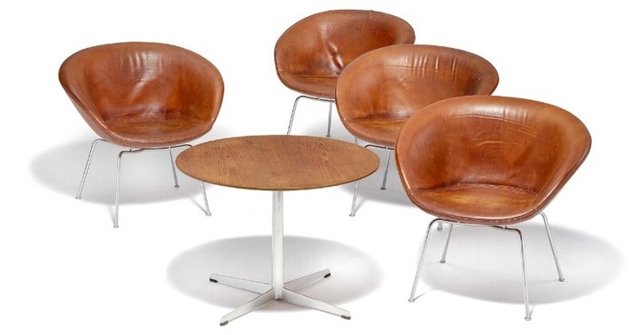 Arne Jacobsen: Set of four “The Pot” armchairs with a matching coffee table, steel frames. (5)