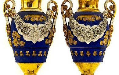 Beautiful pair of Empire porcelain vases. Old France.