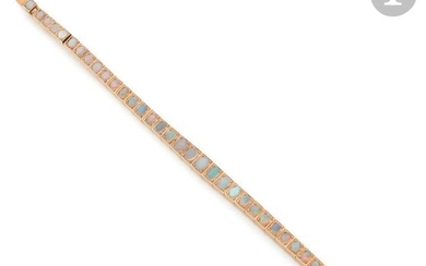 Bracelet articulé en or 18K (750) serti d’opales...