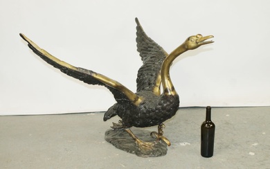 Bronze garden sculpture of a swan