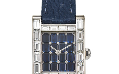 CARTIER. AN EXTREMELY ATTRACTIVE 18K WHITE GOLD AND BAGUETTE DIAMOND-SET...