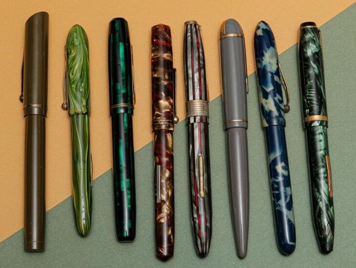COLORFUL GROUP OF VINTAGE FOUNTAIN PENS.
