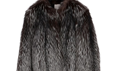 Céline: A renard fox fur with long sleeves, closure with three clasps and black fabric lining inside. Size 40 (FR)