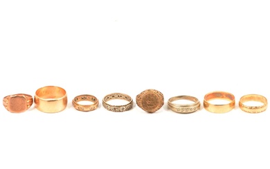 Eight various rings.