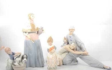 Four Lladro figurines.