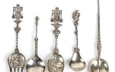Four silver spoons and one silver fork