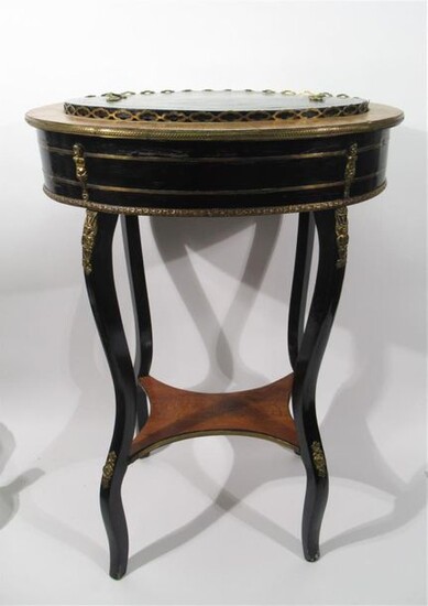 GARDENERY in blackened wood and veneer oval-shaped discovering a sheet metal basin with its cover, rests on four console legs connected by a spacer shelf. Decorated with gilded bronze friezes and small brass putti.
