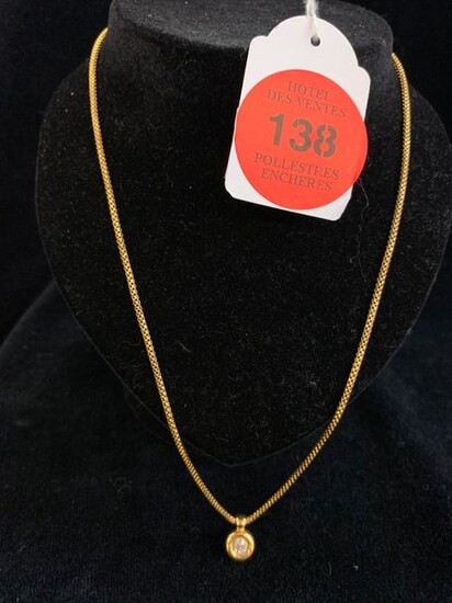 GOLD CHAIN WITH GOLD PENDANT SET WITH A 0.50 CT DIAMOND. TOTAL GROSS WEIGHT 11.90 G