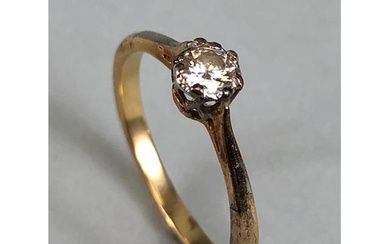 Gold Solitaire ring set with a single diamond, no hallmarks,...