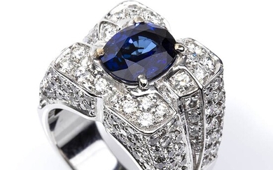 Gold, sapphires and diamonds ring 18k white gold, with central...