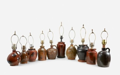 Group of ten redware jars and jugs fitted as lamps