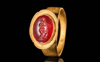 HELLENISTIC GOLD RING WITH CARNELIAN INTAGLIO DEPICTING MARSYAS