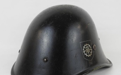 HOLLAND. TENO M37 helmet in black painted steel,...