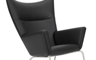 Hans J. Wegner: “Wingchair”. Easy chair with steel frame. Sides, seat and back upholstered with black leather. Model CH 445.