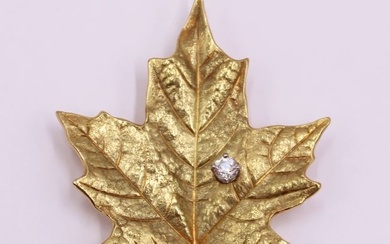 JEWELRY. 18kt Gold and Diamond Leaf Form Brooch.