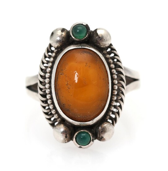 SOLD. Kay Bojesen: An amber and agate ring set with a cabochon amber piece and two green agates, mounted in silver. Size 56. – Bruun Rasmussen Auctioneers of Fine Art