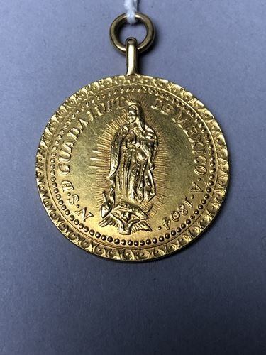 Médaille de Notre-Dame de Guadeloupe. Or. 18 carats....