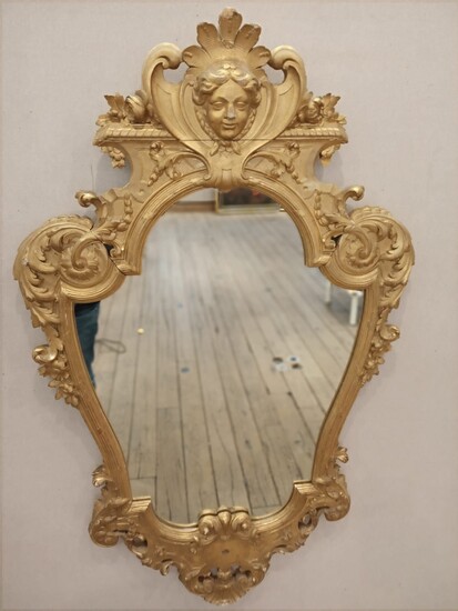 Miroir en bois sculpté et doré de forme mouvementé... - Lot 338 - Rossini